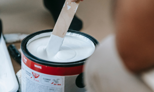 Stirring paint with stir stick